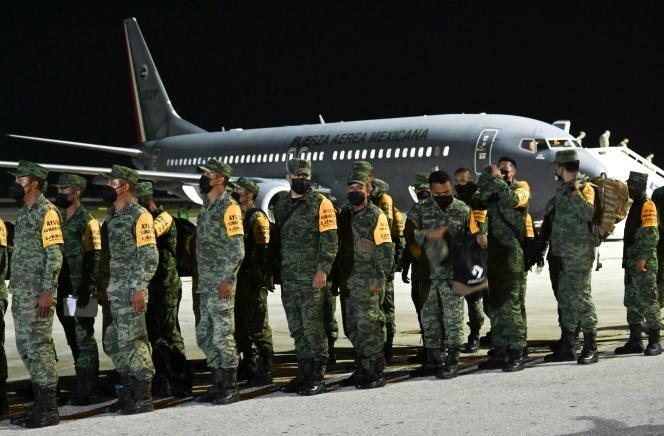 A group of Mexican soldiers disembark at Juan Gualberto Gomez Airport, in Matanzas Province, Saturday, August 6, 2022. 